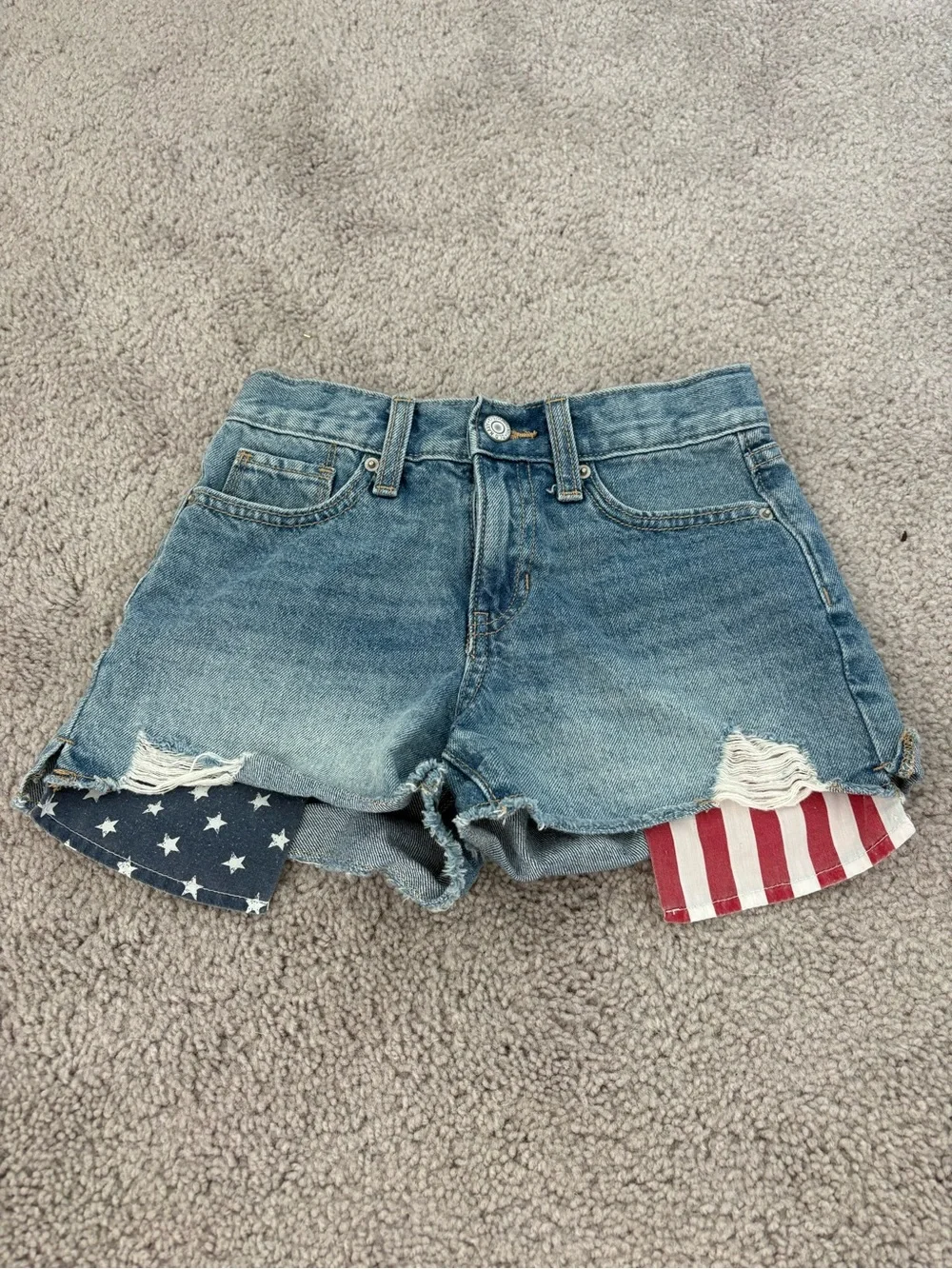 Old Navy high-waisted denim shorts with American flag design